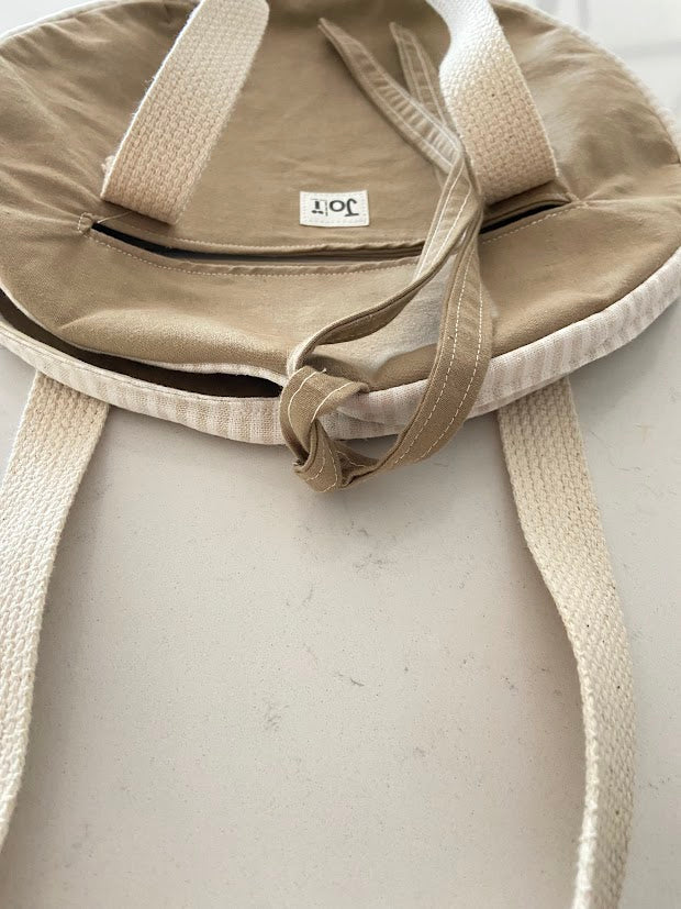 Sac rond beige et marron