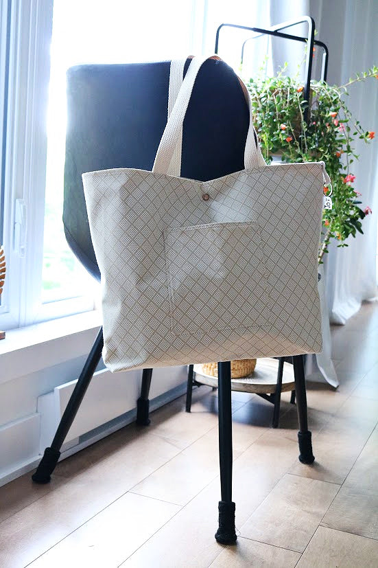 Sac cabas beige design losange blanc, extra large, avec poche sur le devant